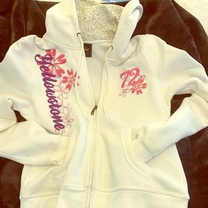White Yellowstone zip up jacket.